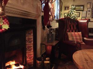 relax by the open fire in Keanes back bar