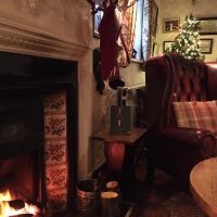 relax by the open fire in Keanes back bar