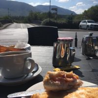 Cycling in Connemara take time out for a toasted sandwich outside Keanes Bar